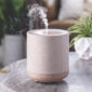 DESIGN: With its effortless neutral design, the Natural Linen Ultrasonic Diffuser makes an elegant addition to any contemporary home. Enjoy the aromatic advantages of essential oils with a diffuser that perfectly matches your minimalist style and decor. Wrapped in real, high quality linen, this diffuser provides a luxury look and feel that compliments any surrounding decor.
USE: 120 mL capacity allows for 4-8 hours of runtime. It has 2 mist modes, continuous or intermittent. Diffuses through a side, directional slot so you can point it towards your face or any direction you want the mist directed.
INCLUDES: BPA-Free Plastic sleeve, Plastic base, 5 ft cord, Water vessel. Overall Dims: 4.4