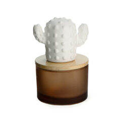 Introducing the Cactus Porcelain Diffuser by Airome, a blend of natural elegance and modern functionality. This beautifully crafted diffuser features a charming ceramic cactus emerging from a sleek wooden lid and a sophisticated vessel. Designed to infuse your home with delightful scents, this diffuser also serves as a striking decorative piece, perfect for adding a touch of desert-inspired charm to any room.