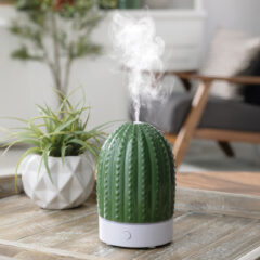 Bring a touch of nature indoors with the Cactus USB Ultrasonic Diffuser. This chic botanical accent is finished in soft celadon green with embossed details.